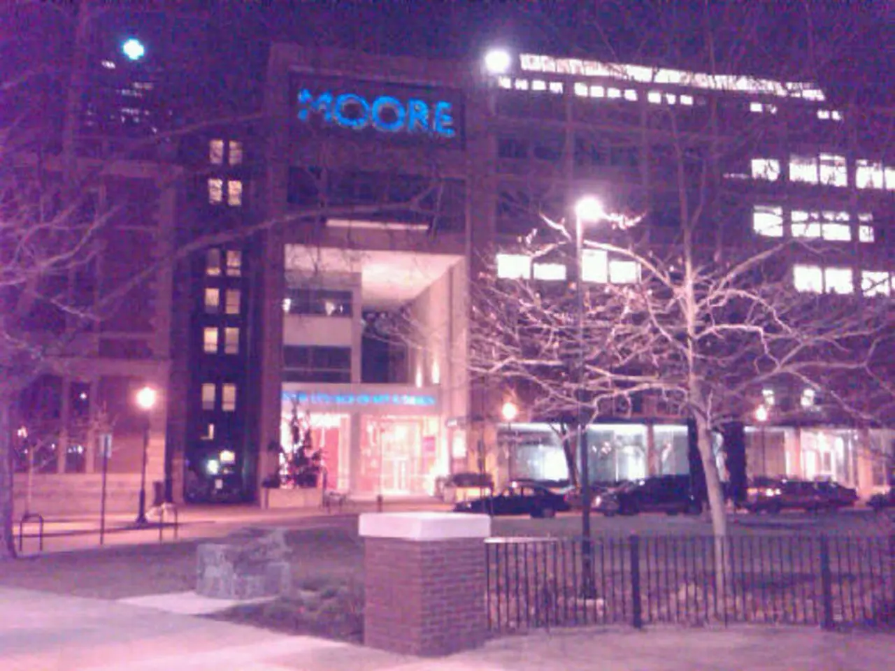 In the image there is a building, it looks like some hospital and in front of the building there...