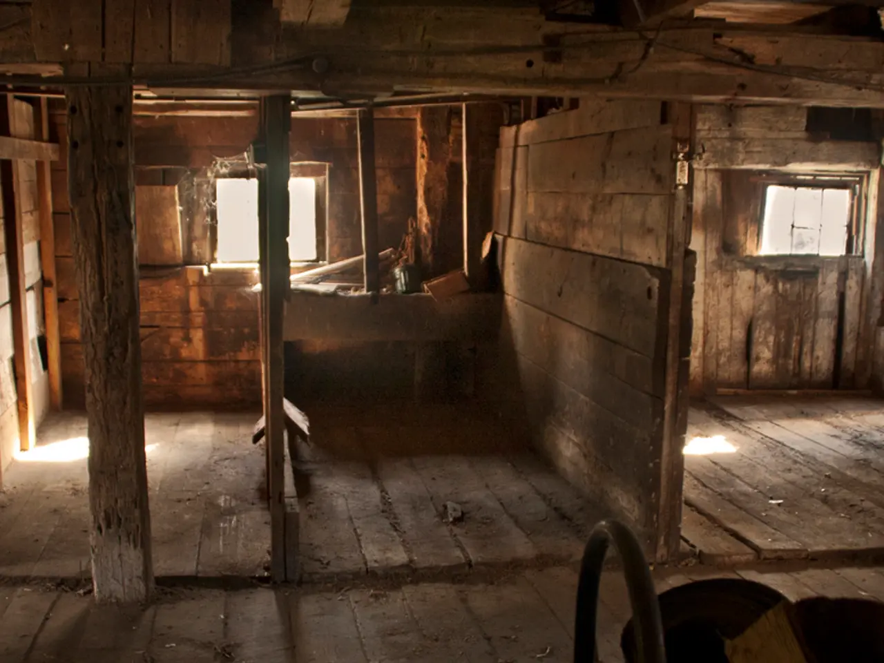 In this image we can see a wooden house, here is the pillar, here is the window, here is the wall.