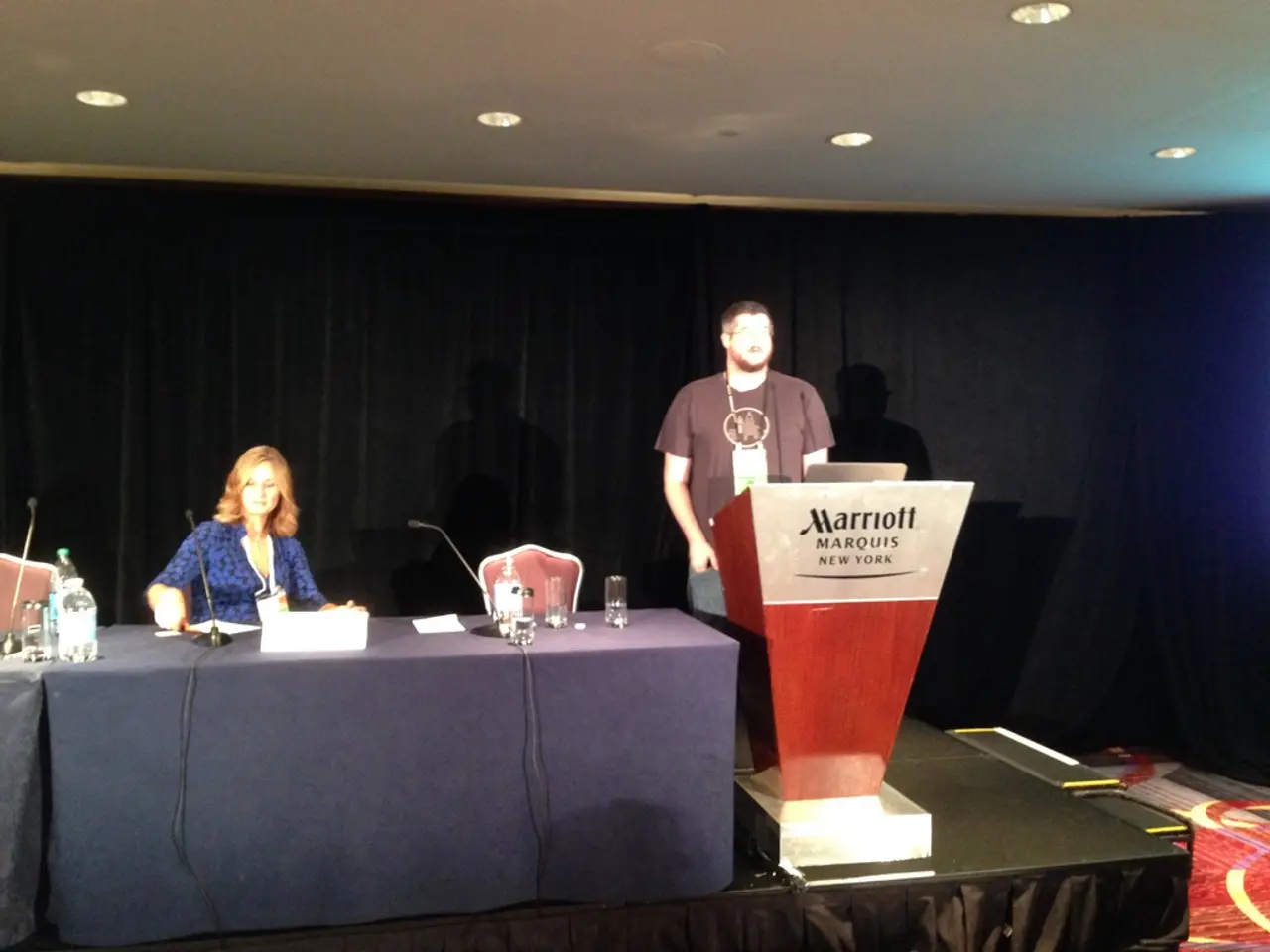 This is the picture of a room where we have a day on which there is a lady sitting on the chair in...