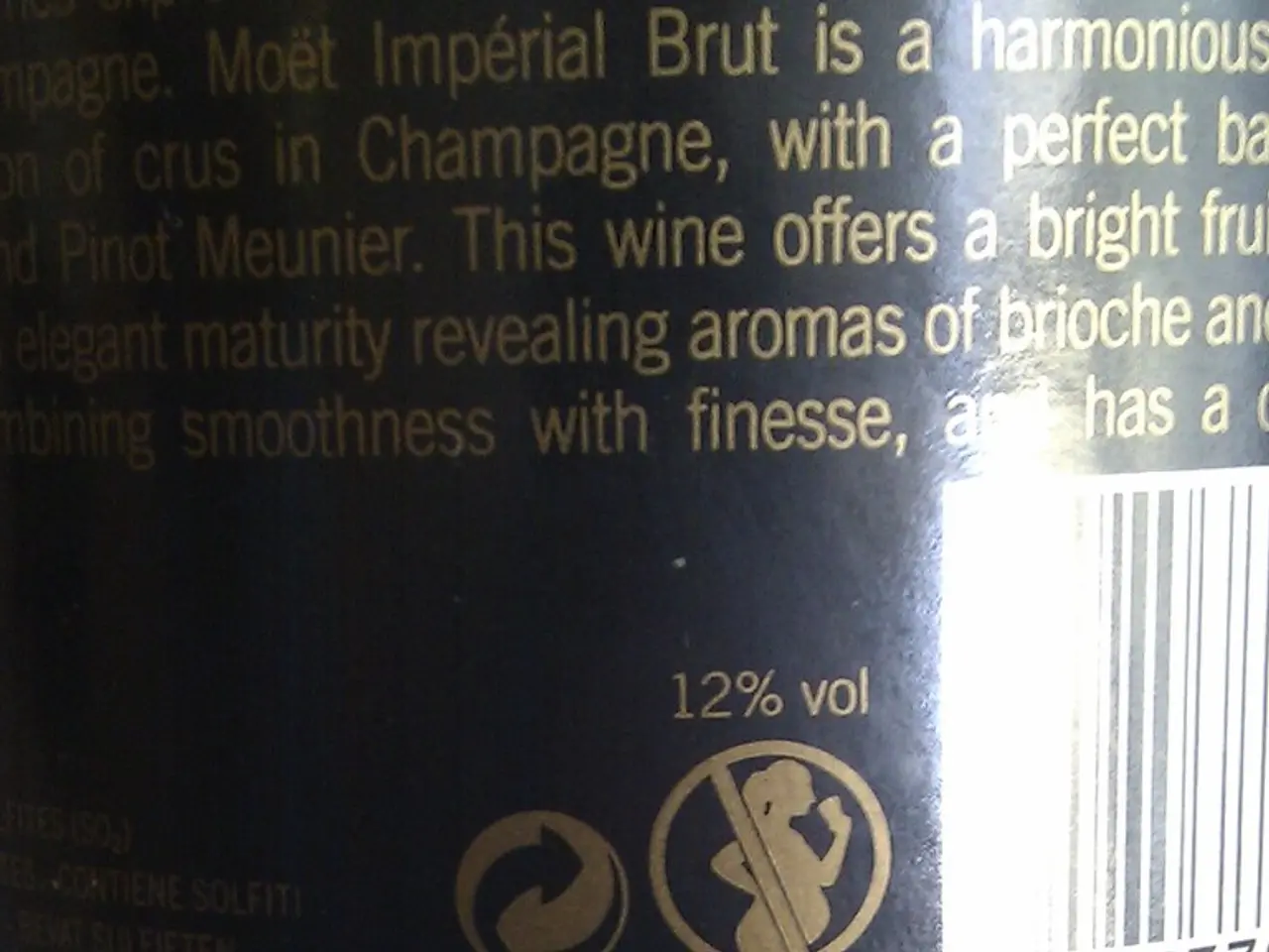 In front of the image there is a bottle with text, bar code and pictures on it.