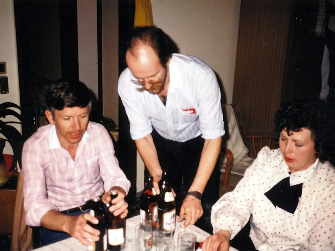 In this image i can see three persons who are having their drinks.