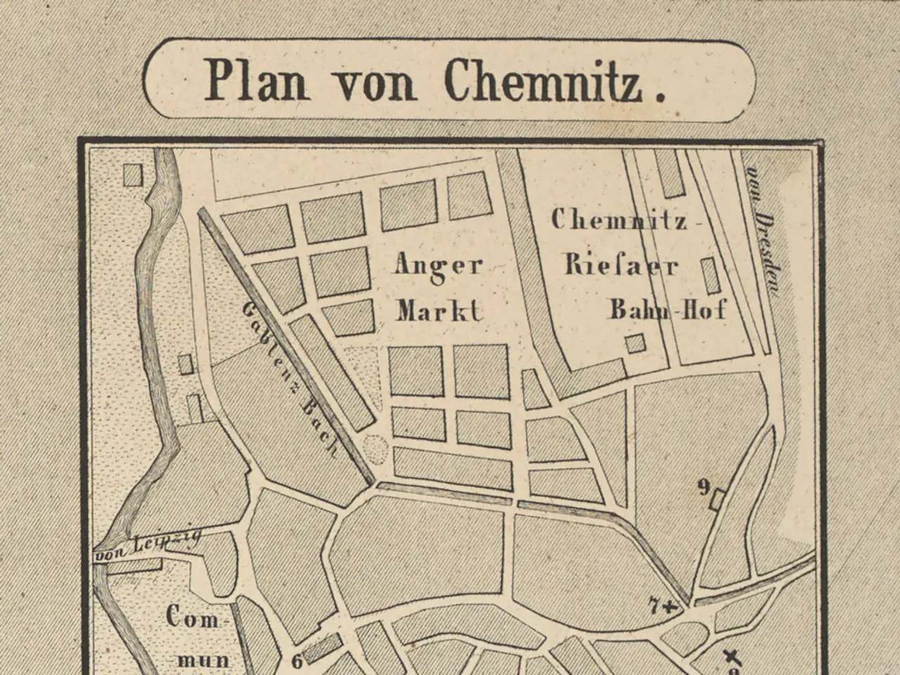 The image shows a paper with a map of the city of Chemnitz, Germany, with text written on it. The...