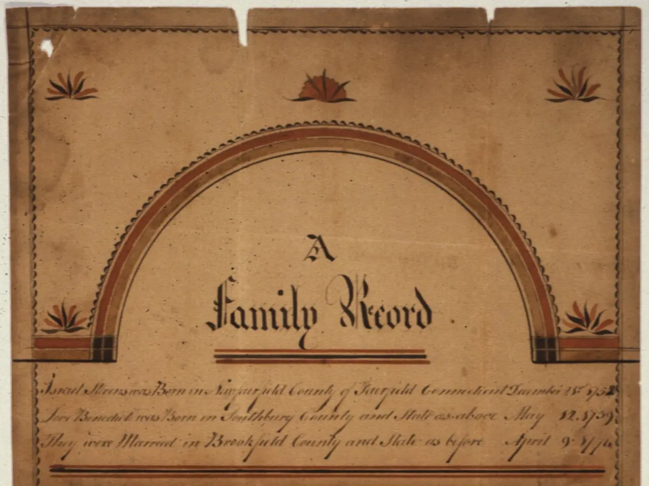 The image shows an old family record on a white background. The paper has text written on it,...