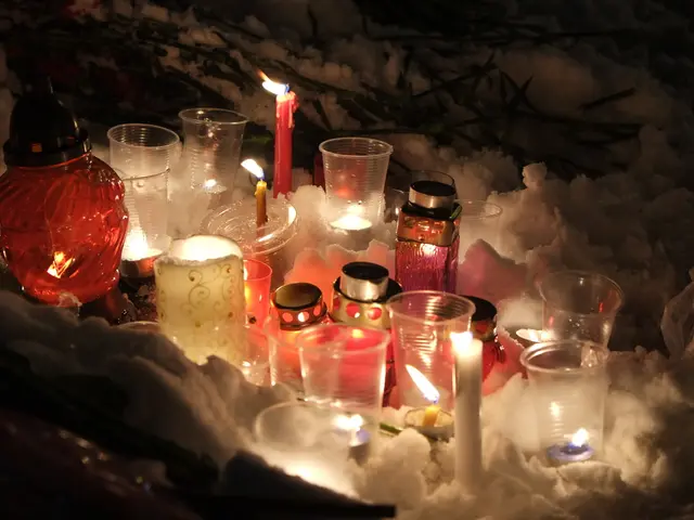 In the center of the image, we can see glasses, jars, bottles and candles which are lighted. At the...