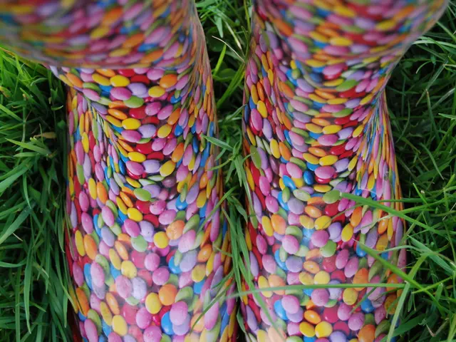 In the picture I can see few gems which are in different colors and there is greenery grass on...