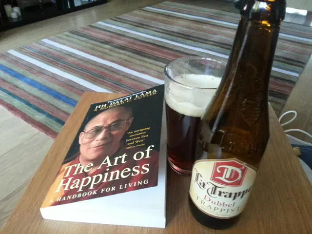 As we can see in the image there is a book, glass and bottle.