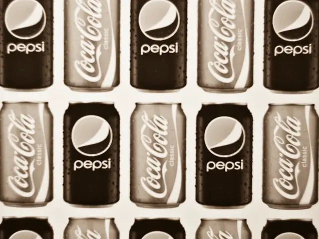 In this picture we can see Pepsi and Coca cola cans.