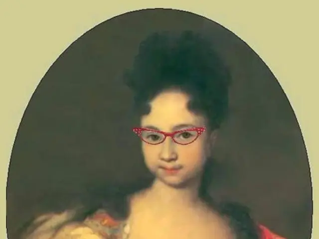 In this picture we can see a woman wore goggles and giving a beautiful smile. She is standing and...