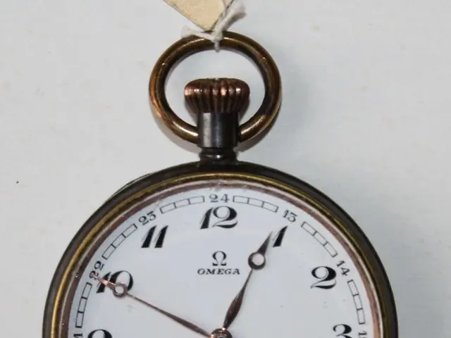 The image shows an Omega pocket watch with a white dial on a white background. The watch has a...