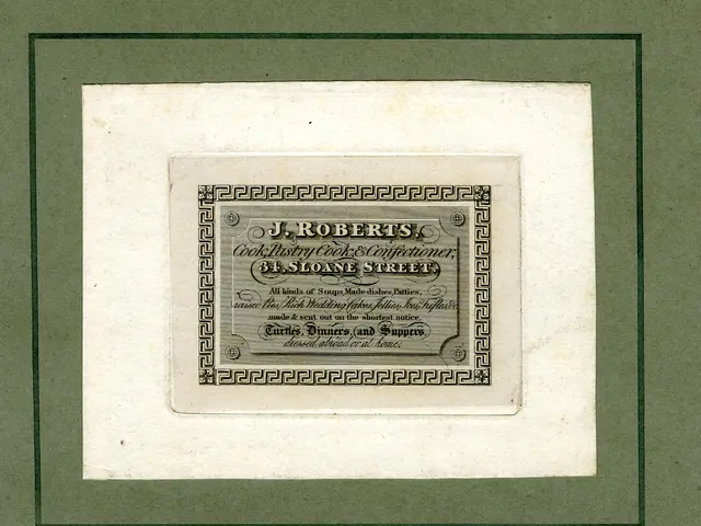 The image shows a photo frame with a paper inside featuring text and numbers. The text reads "J.R....