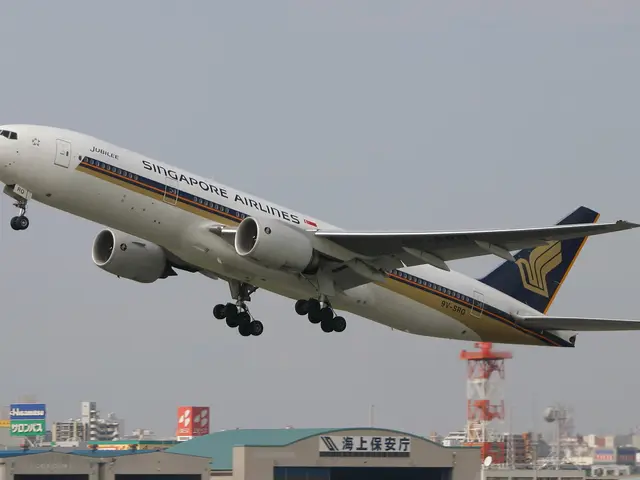 The image shows a Singapore Airlines Airbus A330-300 in flight, with buildings and a tower visible...