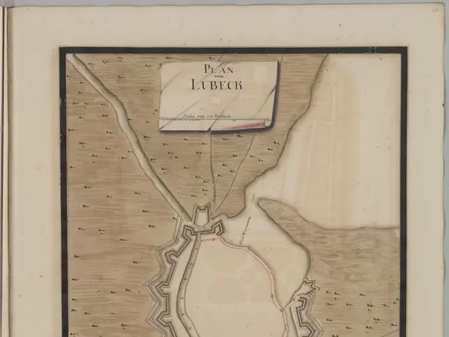 The image shows an old book with a map of the city of Lubeck on it. The map is detailed and shows...