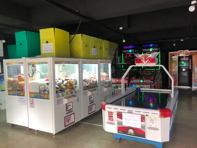 The image shows a room filled with lots of different types of arcade games, including a game...