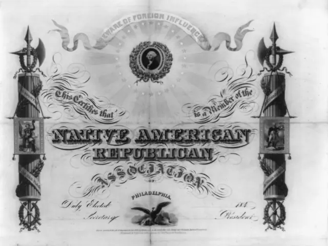 The image shows a black and white certificate with a picture of a man in a suit and tie, surrounded...