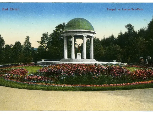 The image shows an old postcard of a gazebo in the middle of a park, surrounded by pillars,...