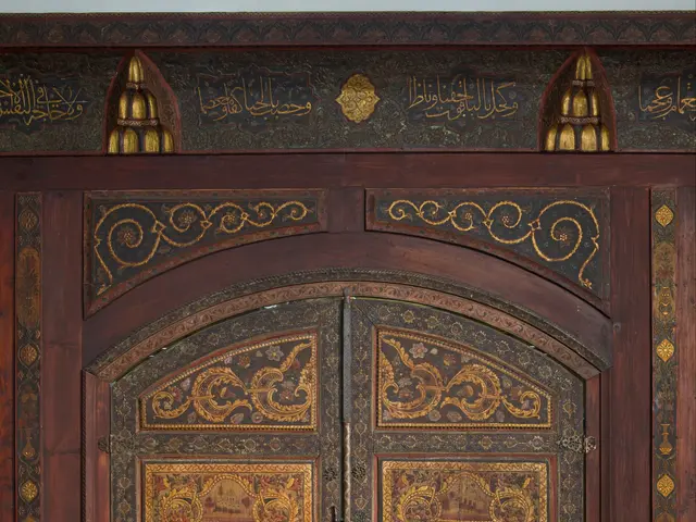 The image shows a wooden door with intricate Islamic calligraphy on it, set against a white...
