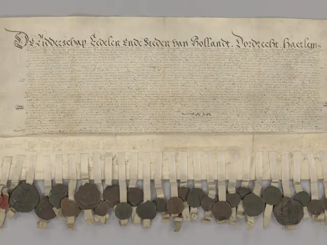 The image shows an old document with a bunch of coins attached to it. The document appears to be a...