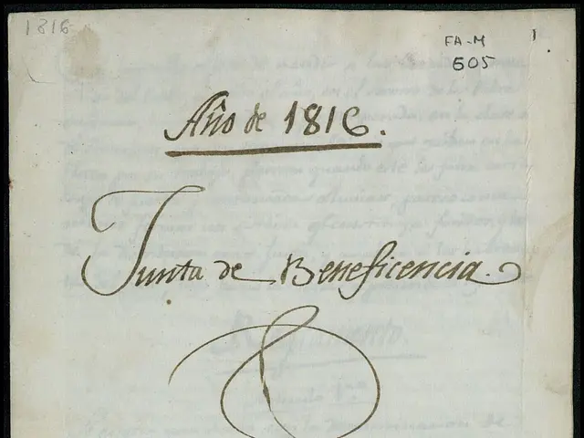 The image shows an old book with a black background and a brown ink stain on it. The text on the...