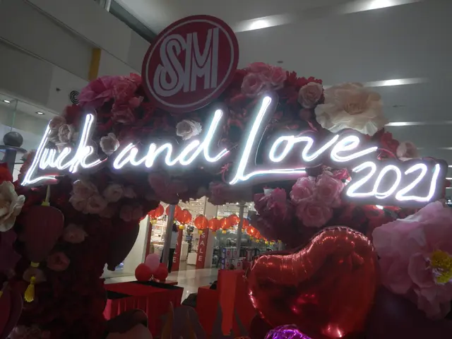 The image shows a store with a sign that reads "Luck and Love 2021" surrounded by flowers,...