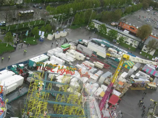 The image shows an aerial view of an amusement park with a roller coaster in the middle, surrounded...