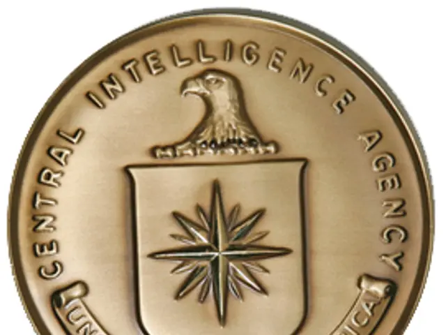 The image shows a gold coin with the words "Central Intelligence Agency" written on it against a...