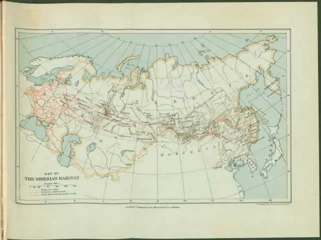 The image shows an old book with a map of the Siberian Railway on it. The map is detailed and shows...