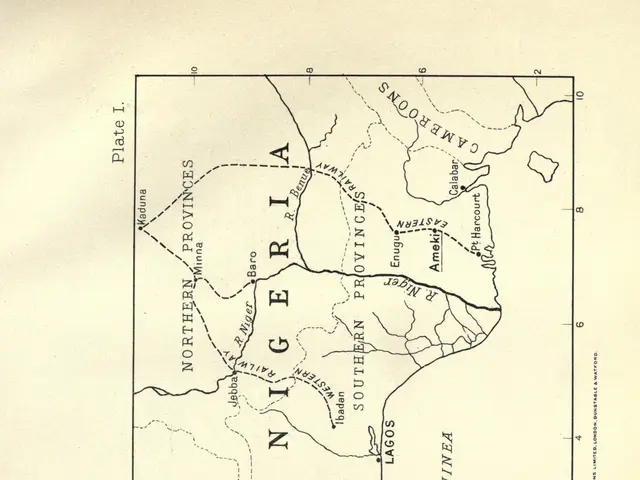 The image shows an old book with a map of Nigeria on it. The map is detailed and shows the various...