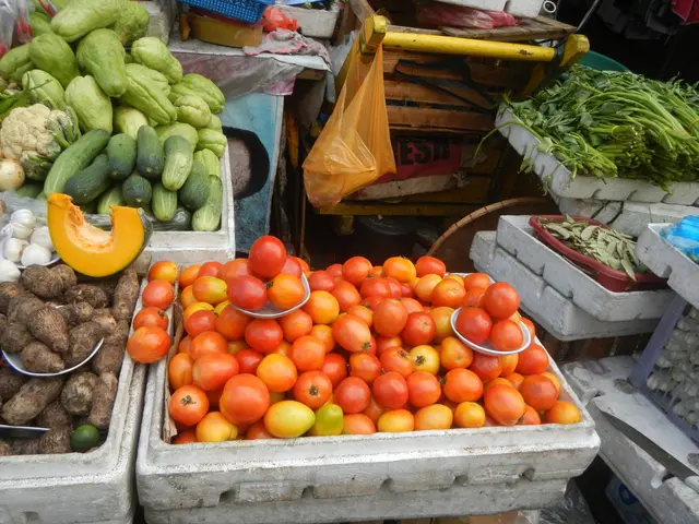 The image shows a market with a variety of vegetables on display, including tomatoes, capsicum,...