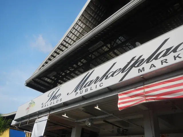 The image shows the Marketplace Public Market in Singapore, with a building in the foreground, a...