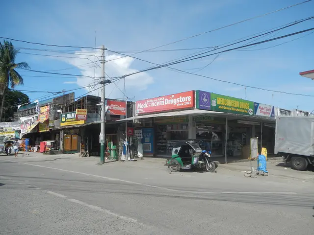 The image shows a street scene with a truck parked on the side of the road. There are buildings,...