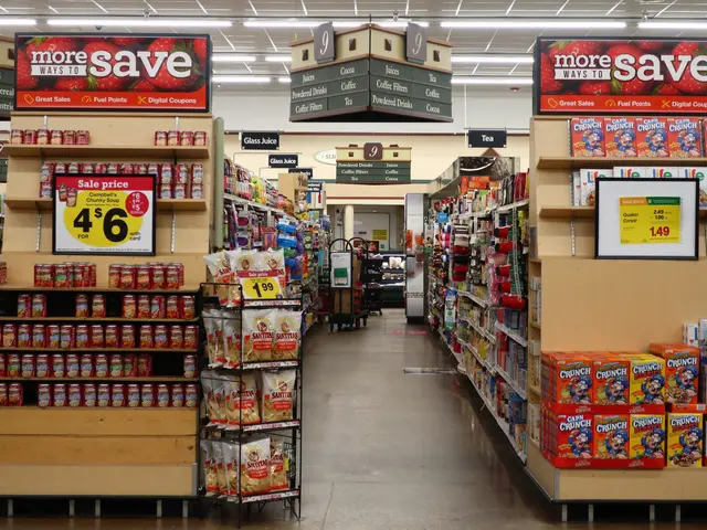 The image shows a store filled with lots of different types of food, arranged in racks and on the...