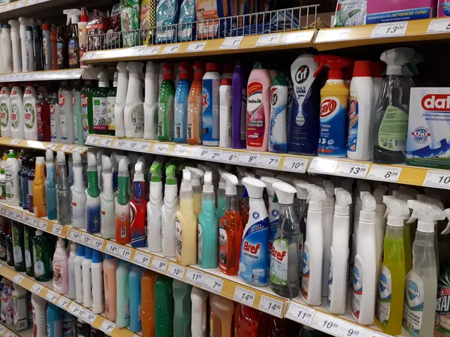 The image shows a store shelf filled with lots of different types of cleaning products, including...