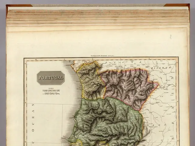 The image shows an old book with a map of Portugal on it. The map is detailed and shows the various...