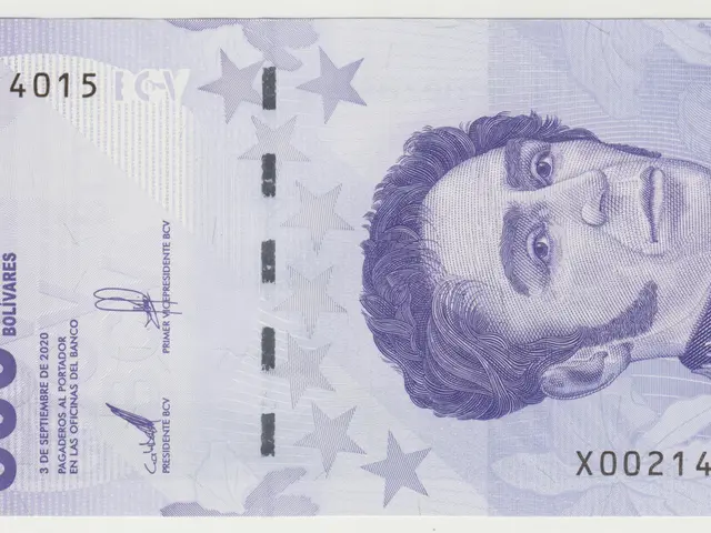 The image shows a 500 mil bolivariana banknote with a portrait of a man on it. The man in the...