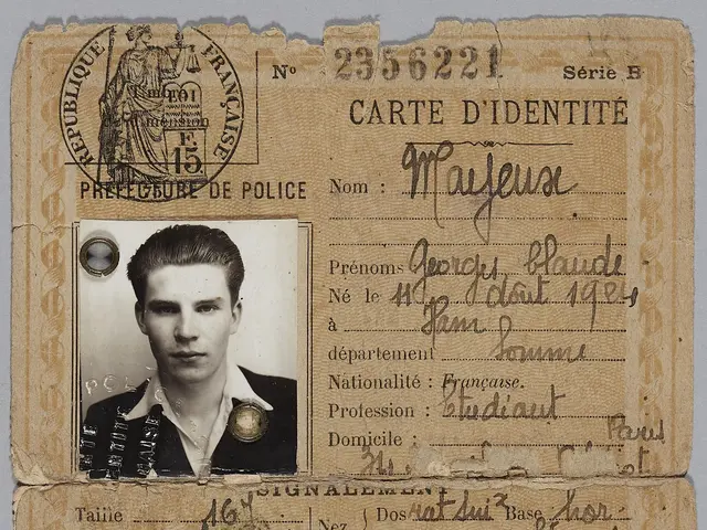 The image shows an old passport with a picture of a man's face on it, along with some text and a...