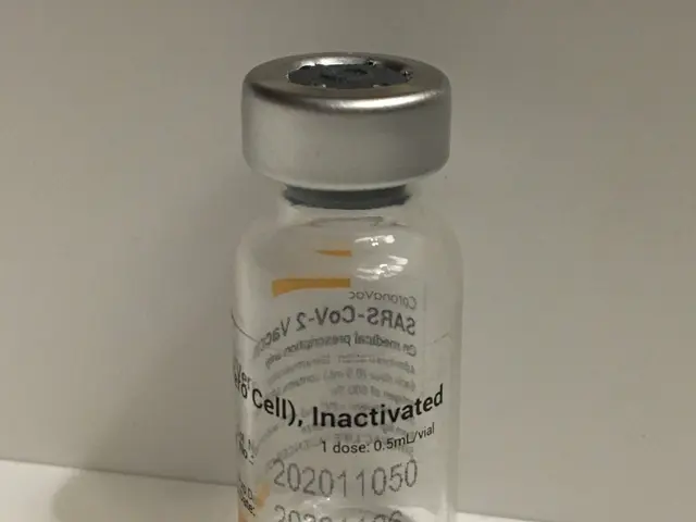 The image shows a vial of Inactivated S-Voc-2A2 in a white vial sitting on top of a white table....