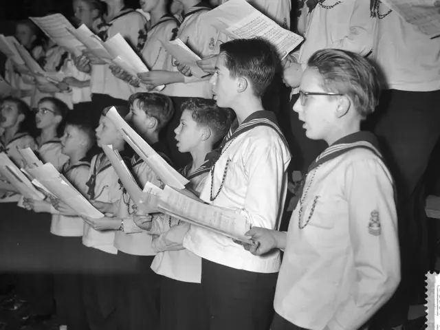 The image shows a group of young boys standing in front of a choir, each holding a book in their...
