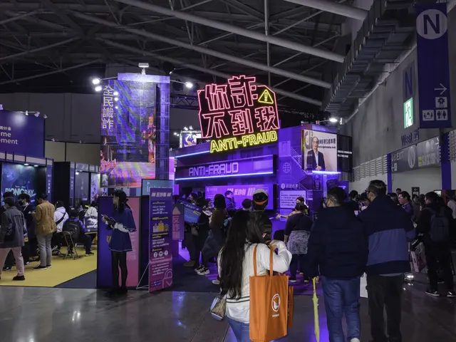 The image shows a large group of people standing in front of a booth at a trade show, with some of...