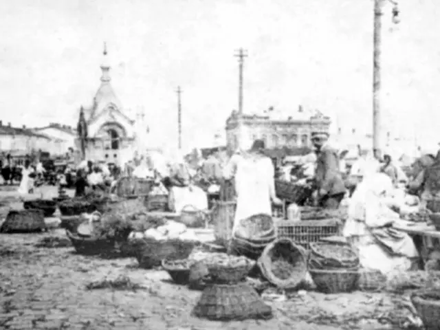 The image shows a black and white photo of a bustling market in the old town of St. Petersburg,...