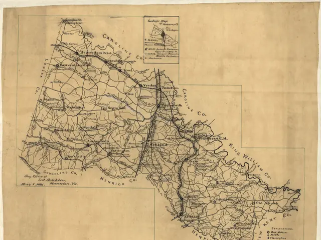 The image shows an old map of the state of North Carolina, with text and numbers on the paper. It...