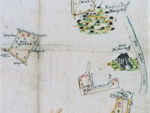 The image shows an old book with a map of a small town on it. The map is detailed and shows the...
