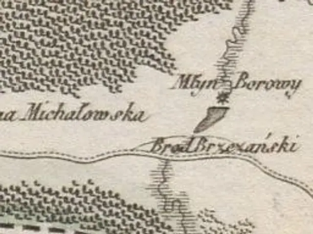 The image shows an old map of the city of Minsk, Belarus, with text written on it. The map is...