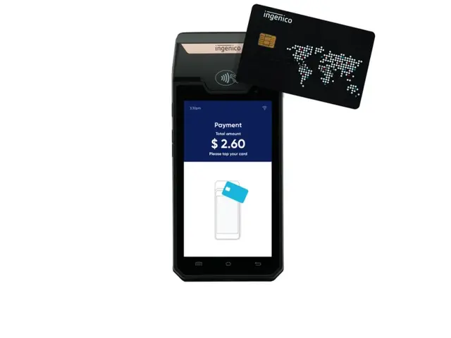 The image shows a mobile phone with a credit card next to it, indicating that it is an ingenico...