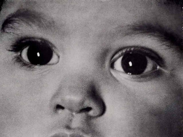 The image shows a poster with a child's face in the center, surrounded by text that reads "Every...