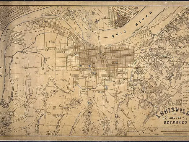 The image shows an old map of the city of Louisville, Kentucky, with a black border around it. The...